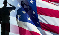 American flag with the silhouette of a solider saluting in front
