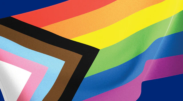 Progress pride flag on a blue background