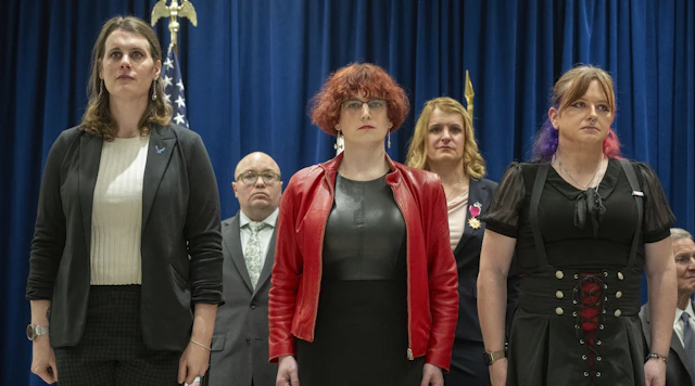 From left, Lt. Col. Erin Krizek (Ret.), Cmdr. Blake Dremann (Ret.), Sgt. 1st Class Catherine Schmid (Ret.), Col. Bree Fram (Ret.), and Chief Petty Officer Jaida McGuire (Ret.) stand during their military retirement ceremony at the Human Rights Campaign Headquarters, Thursday, Jan. 8, 2026 in Washington. (Kevin Wolf/AP Content Services for Human Rights Campaign)
