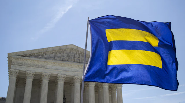 HRC flag waving in front of a building