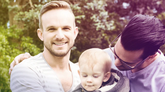 Gay male coupe with baby